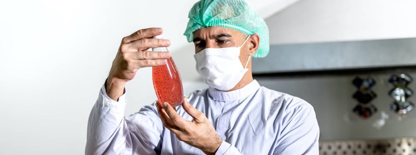 Worker checking soft drinks