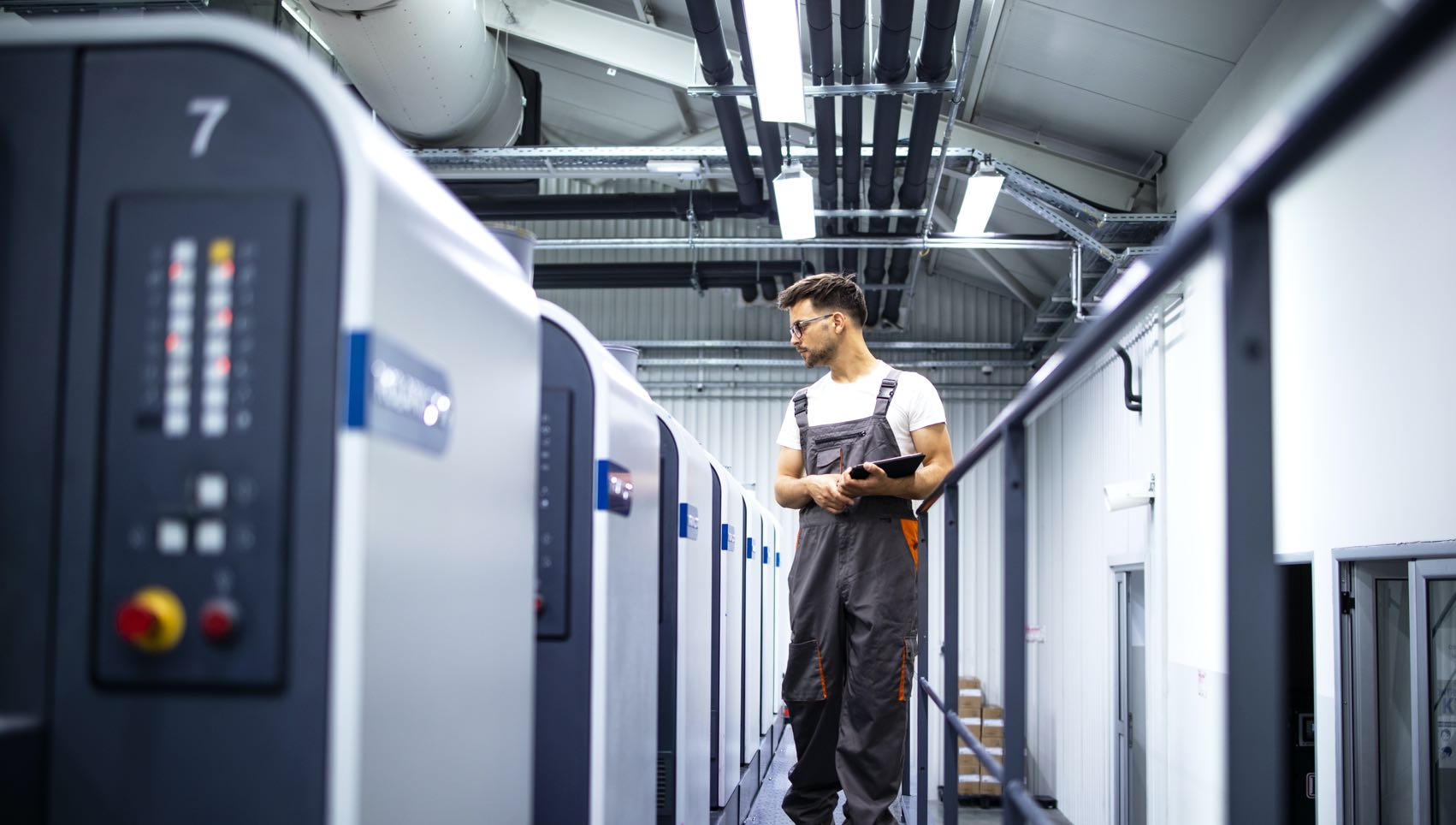 operator checking digital printers